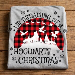 i'm dreaming of a hogwarts christmas castle silhouette with flying creatures buffalo check hogwarts castle silhouette svg design printed on a plain product mockup
