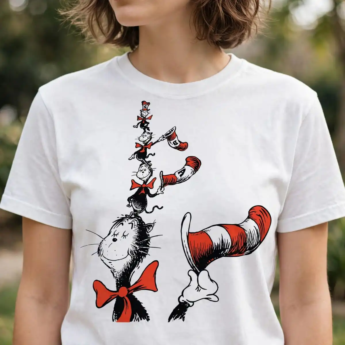 whimsical stacked balance cats in hats design for read across america cat hat stacked balance svg design printed on a plain product mockup