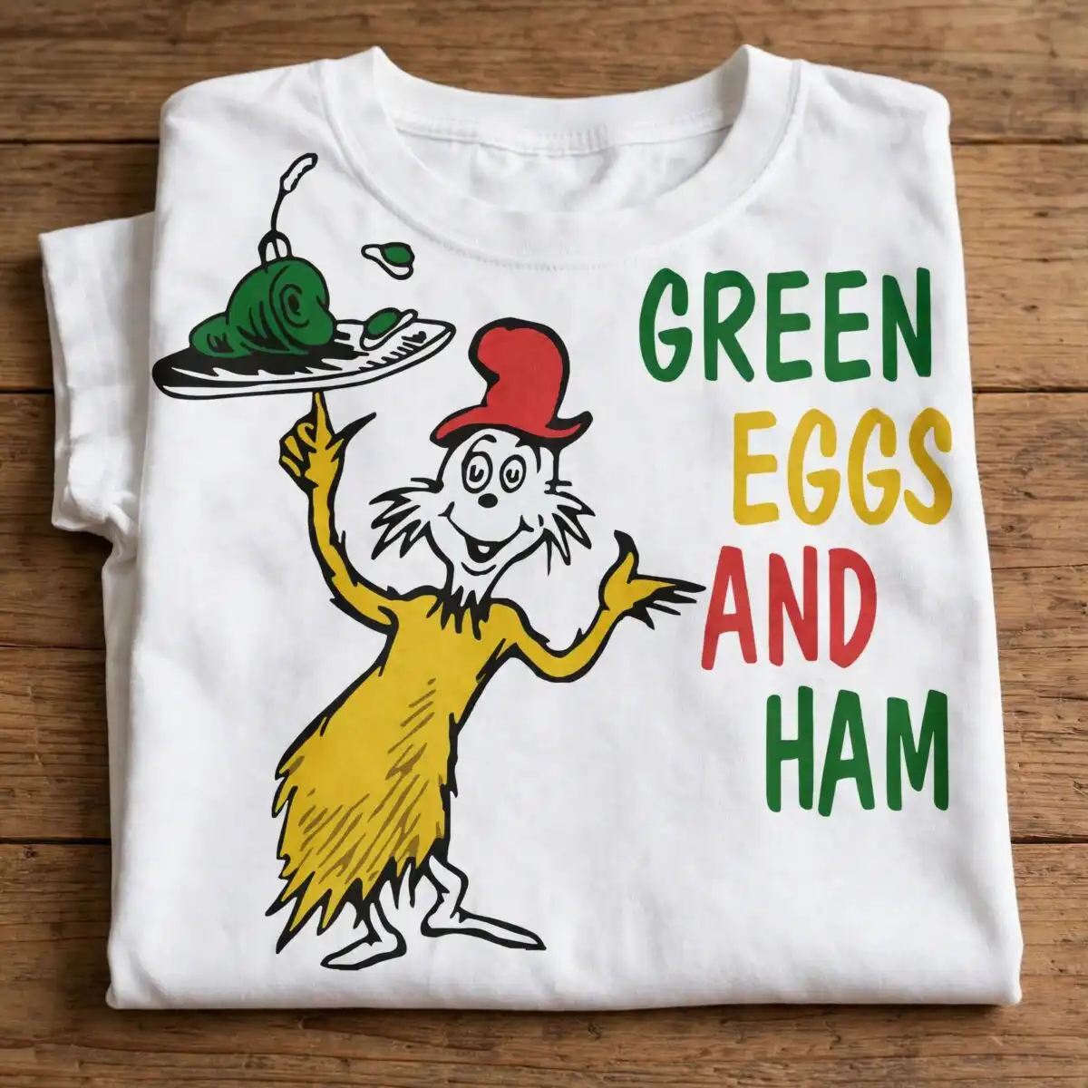 green eggs and ham shirt design with sam-i-am holding silver plate green eggs and ham shirt design design printed on a plain product mockup