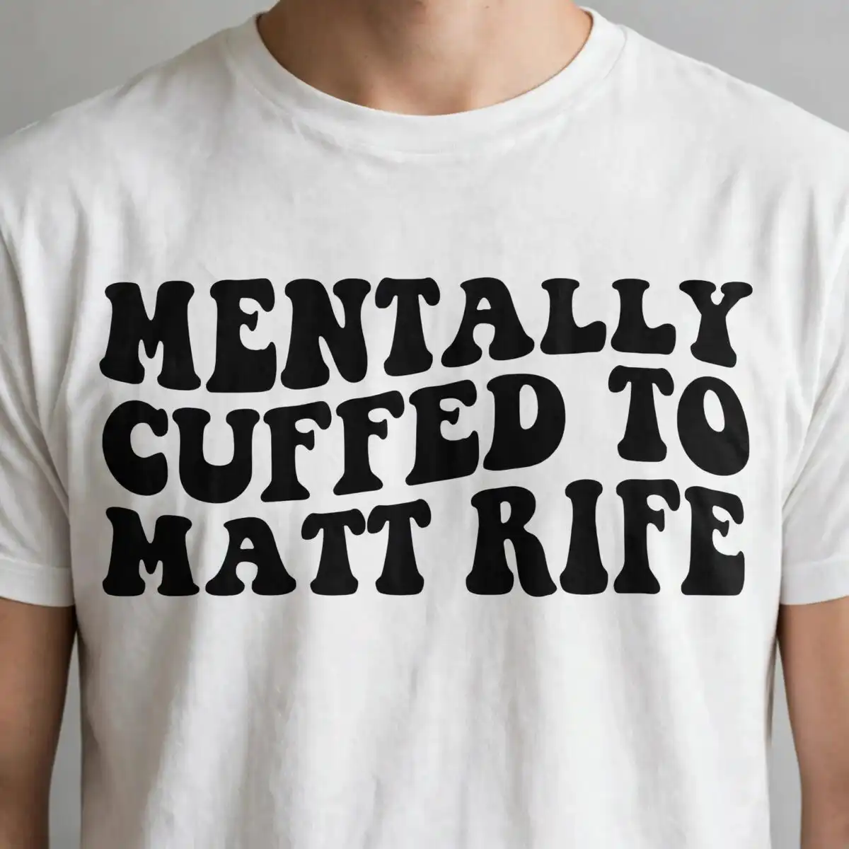 mentally cuffed matt rife svg design printed on a plain product mockup