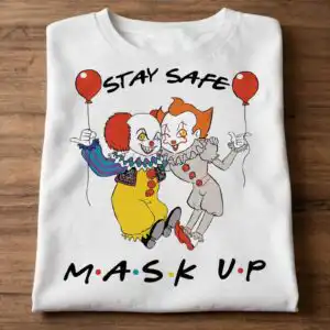 stay safe mask up design with two cartoon clowns and red balloons stay safe mask up svg design printed on a plain product mockup