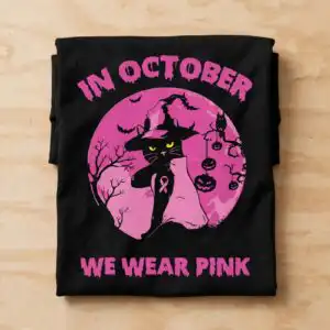 black cat in a witch hat halloween svg with pink ribbon and in october we wear pink black cat with witch hat clipart design printed on a plain product mockup