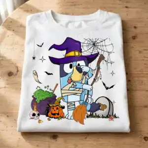 bluey heeler halloween witch dog with cauldron and pumpkin bluey heeler png design printed on a plain product mockup