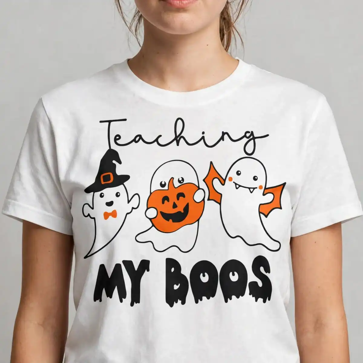 teaching my boo halloween design with three cute ghosts for teachers teaching my boo halloween svg design printed on a plain product mockup