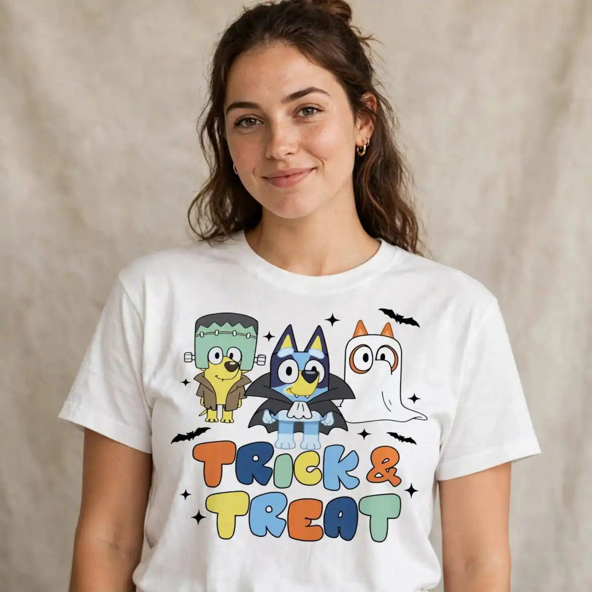bluey trick or treat halloween dogs costume graphic bluey trick or treat png design printed on a plain product mockup