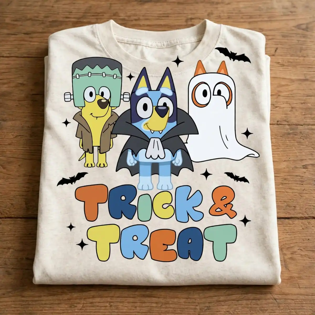 bluey trick or treat halloween dogs costume graphic bluey trick or treat png design printed on a plain product mockup