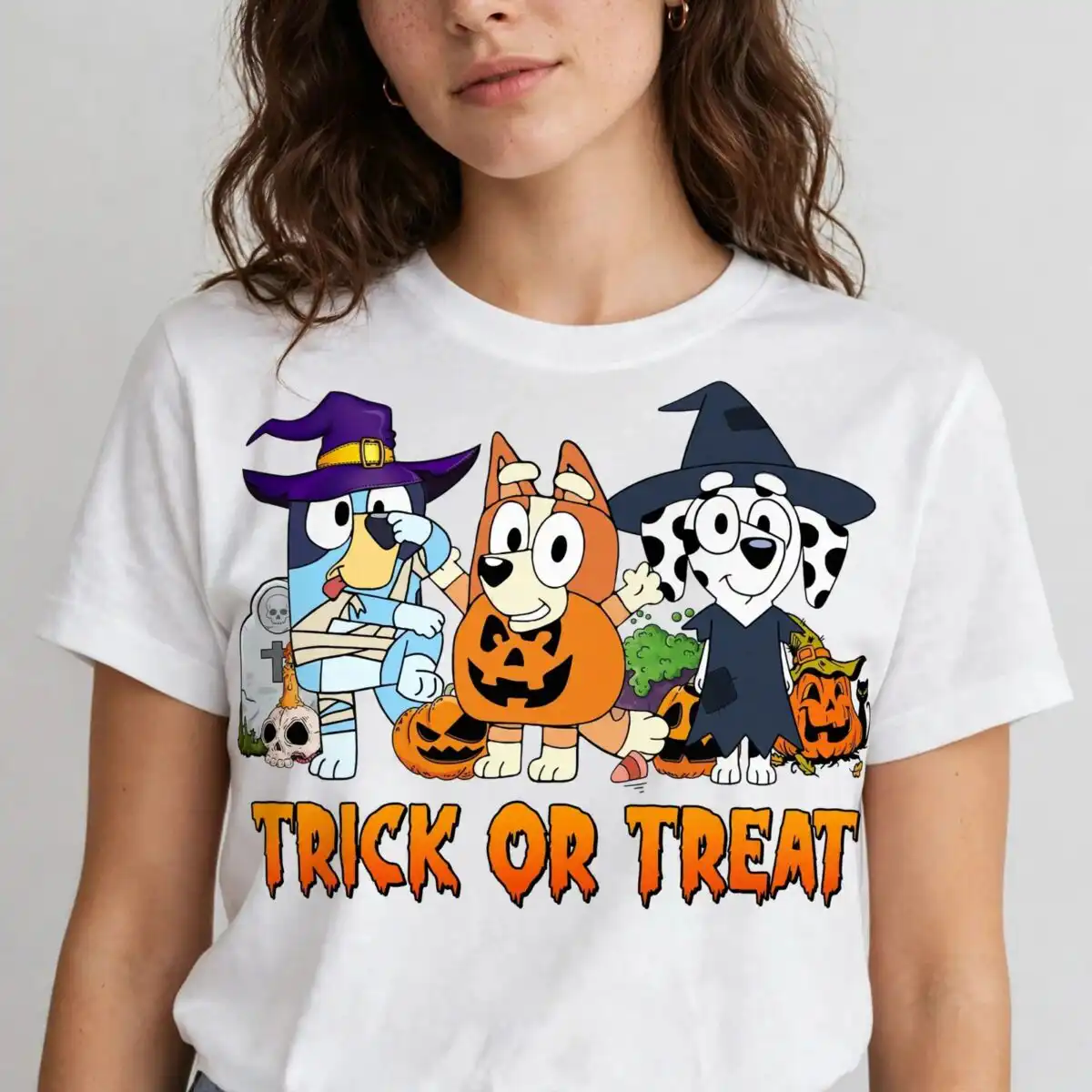 halloween bluey friends trick or treat shirt png for festive crafts halloween bluey png design printed on a plain product mockup