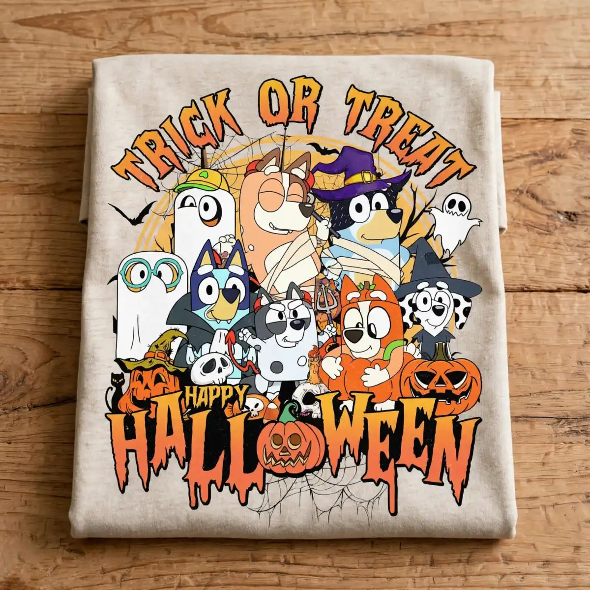 cute halloween dogs trick or treat costume group with pumpkins halloween trick or treat png design printed on a plain product mockup