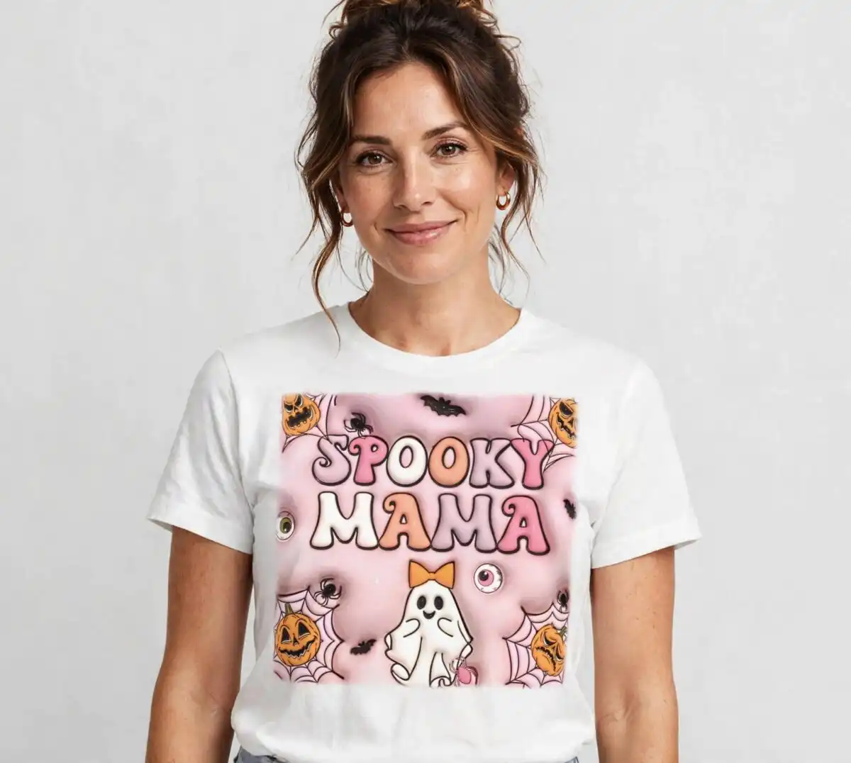3d inflated spooky mama shirt png with ghost, pumpkins and halloween text 3d inflated spooky mama shirt png design printed on a plain product mockup