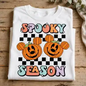 disney mouse spooky season pumpkins design with retro lettering for shirts disney mouse spooky season png design printed on a plain product mockup