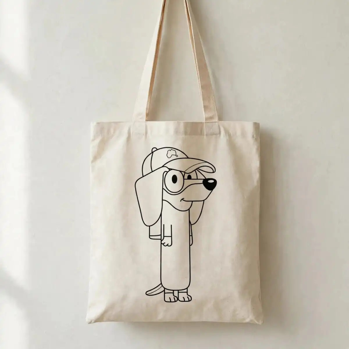 snickers outline bluey cartoon dachshund with cap and glasses kids design snickers outline bluey bluey svg design printed on a plain product mockup