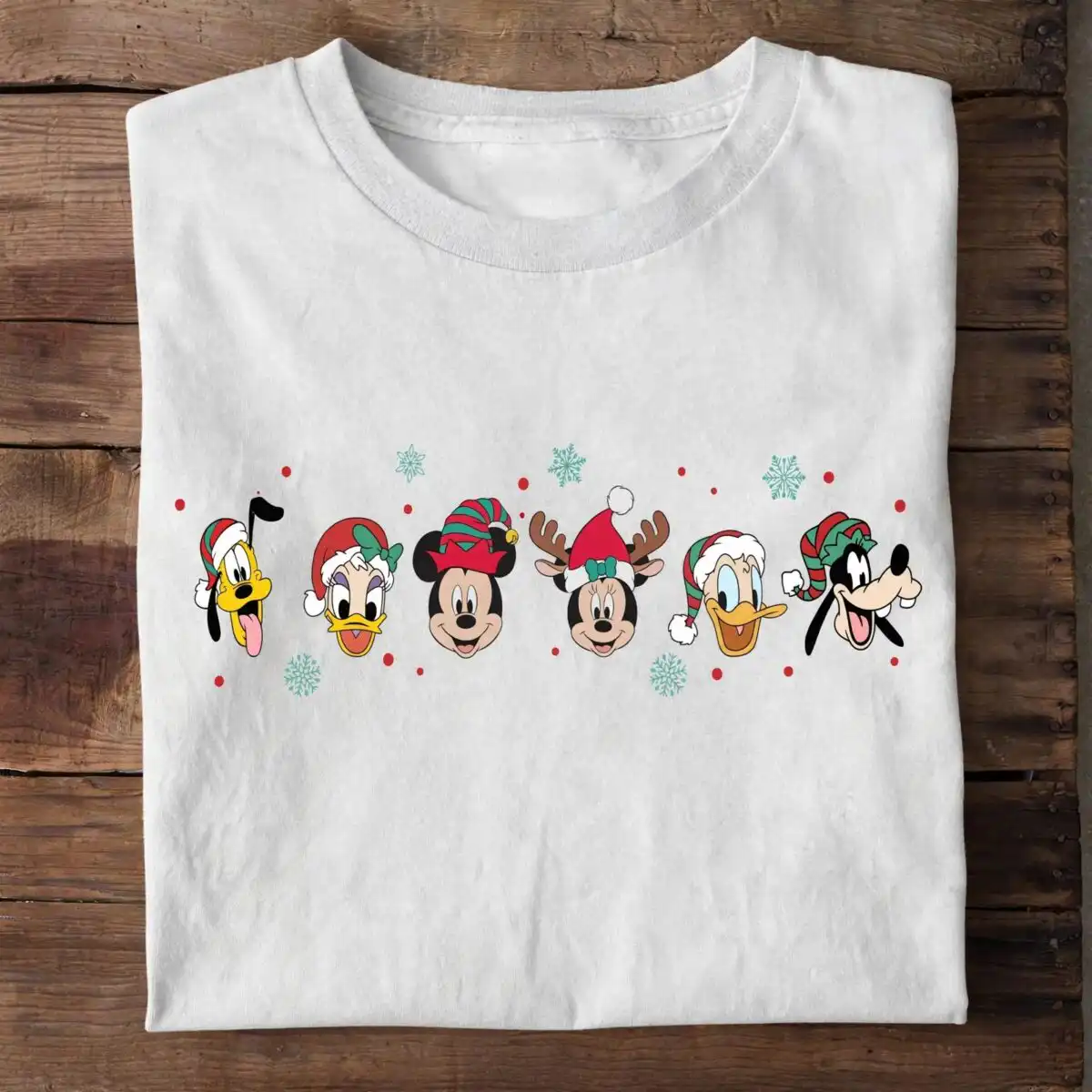 disneyland merry christmas shirt png with six cheerful festive friends disneyland merry christmas shirt png design printed on a plain product mockup