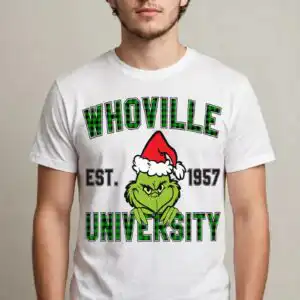 a green furry character wearing a Santa hat with text above and below design printed on a plain product mockup