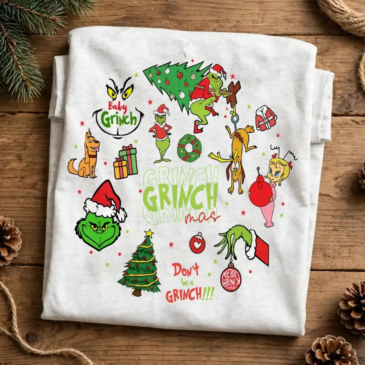 A collection of green characters, a dog, and a girl in various Christmas-themed poses and outfits, along with festive objects