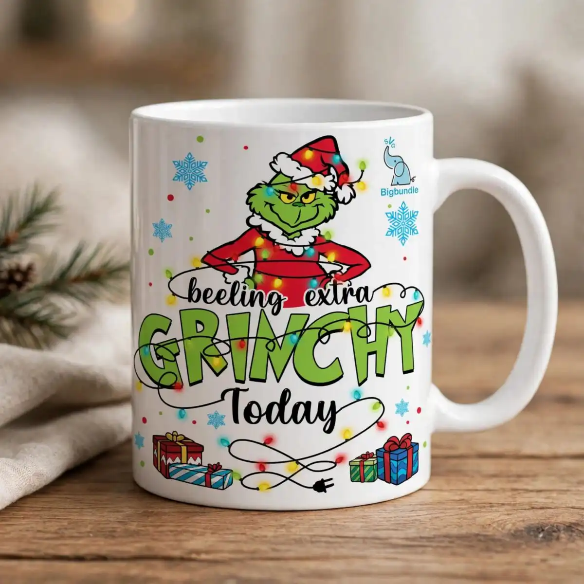 A green character in a Santa hat and suit, tangled in Christmas lights, with text and gift boxes. design printed on a plain p