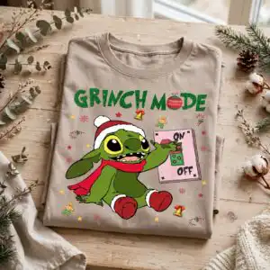 stitch mode christmas png with grinch mode lettering for holiday shirts stitch mode christmas png design printed on a plain product mockup