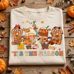 tis the season thanksgiving shirt art with cartoon pumpkin spice cups tis season thanksgiving thanksgiving shirt png design printed on a plain product mockup
