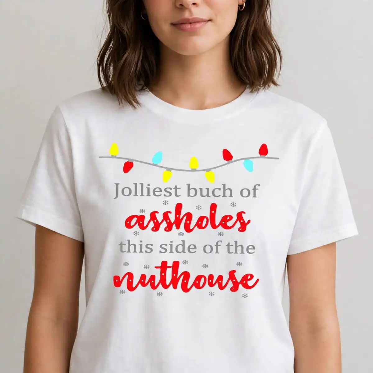 jolliest bunch quote design with string of christmas lights string of christmas lights svg design printed on a plain product mockup