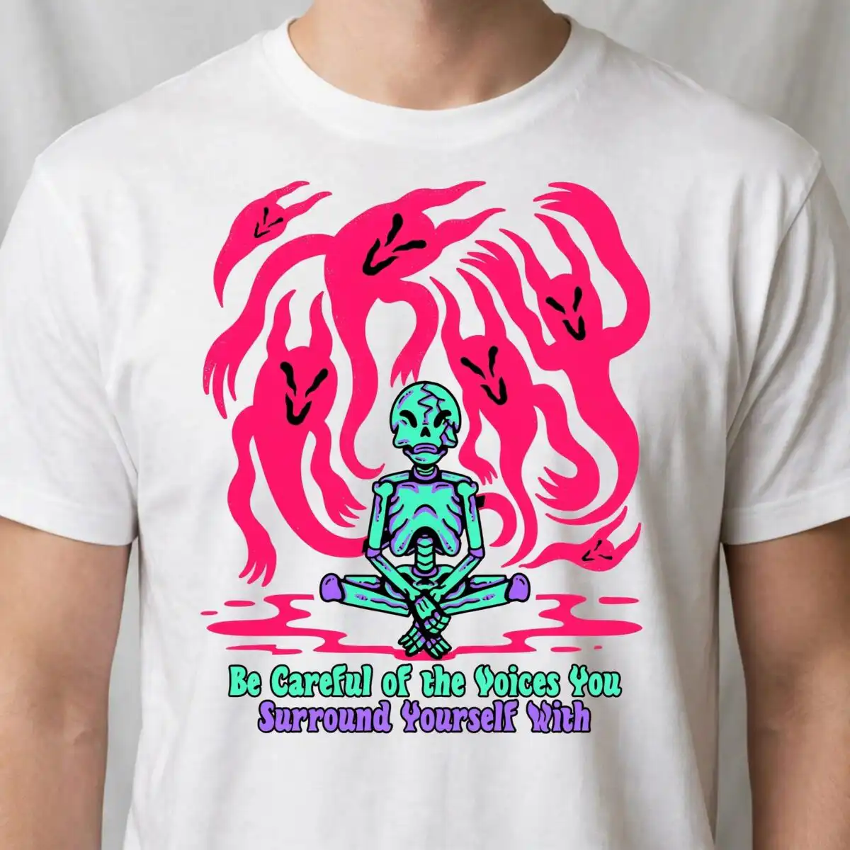 be careful of the voices you surround yourself with meditating skeleton graphic be careful voices you svg design printed on a plain product mockup