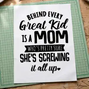 funny mom quote behind every great kid design for mother's day shirts behind every great kid svg design printed on a plain product mockup