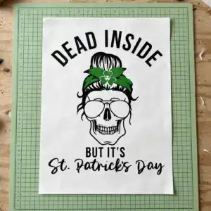st patrick's day female skull messy bun svg design printed on a plain product mockup
