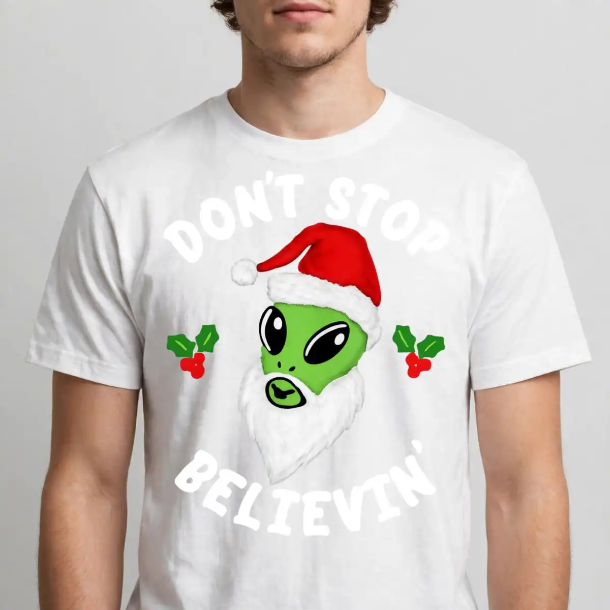 alien don't stop belive christmas shirt design with santa hat alien don't stop belive svg design printed on a plain product mockup