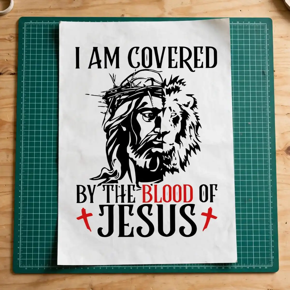 cross with jesus religious portrait - i am covered by the blood design cross with jesus svg design printed on a plain product mockup