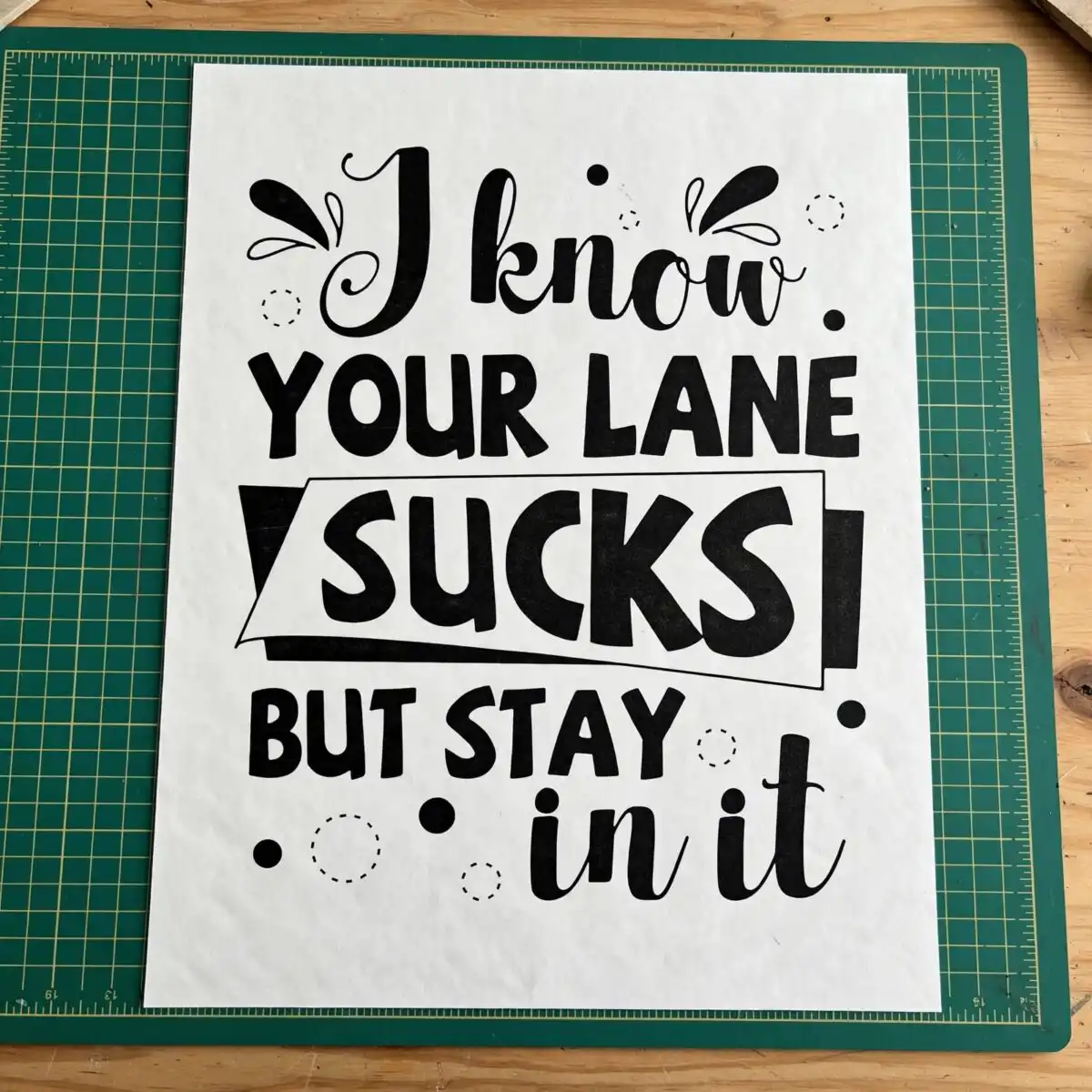i know your lane sucks but stay in it svg design printed on a plain product mockup