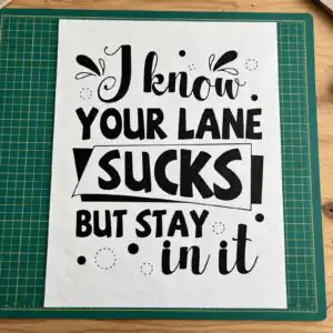 i know your lane sucks but stay in it svg design printed on a plain product mockup