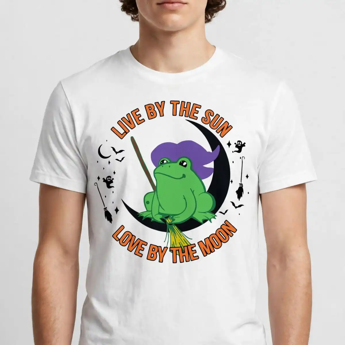 live by the sun love by the moon halloween frog witch shirt design live by the sun love by the moon svg design printed on a plain product mockup