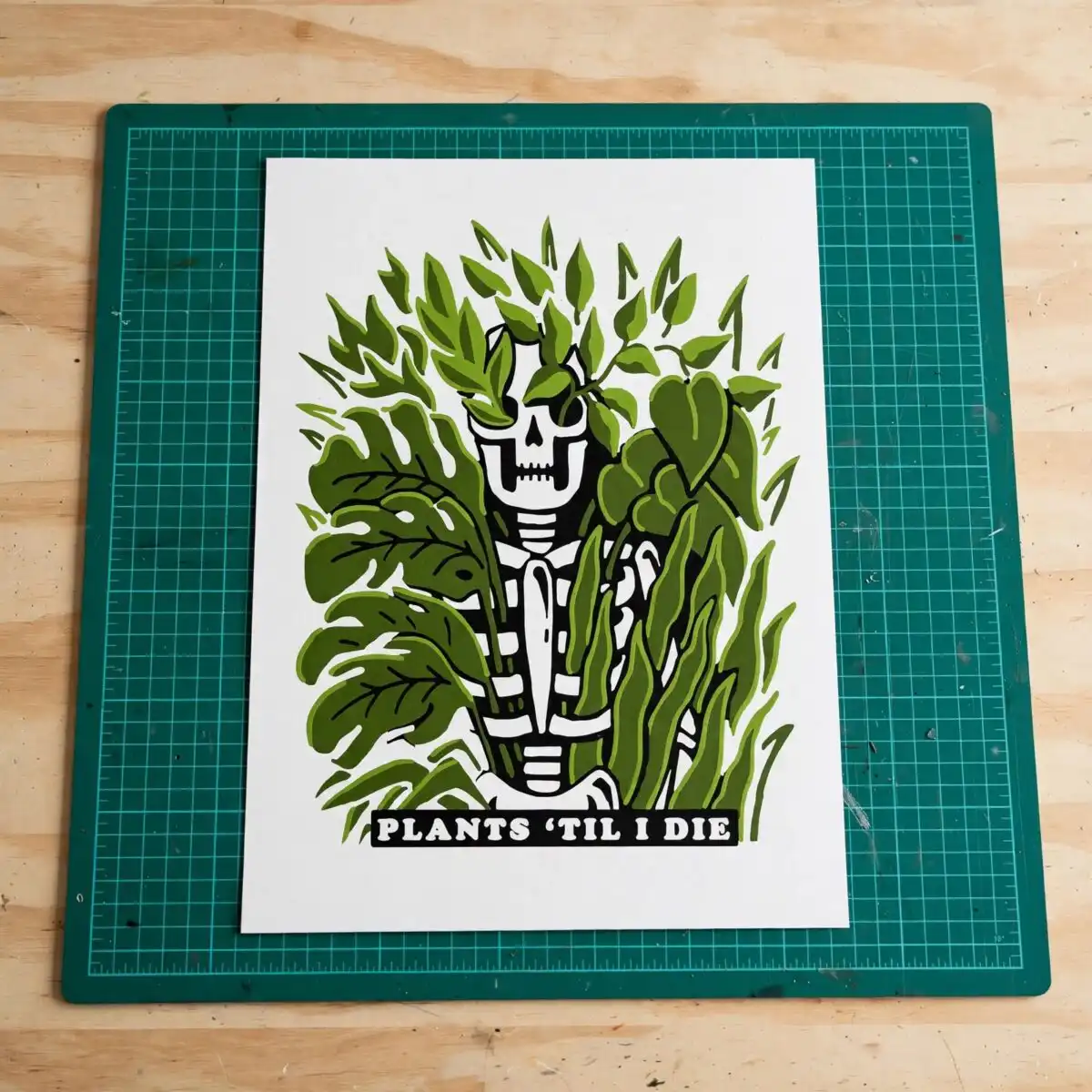 plants 'til i die skeleton surrounded by houseplants funny quote skeleton surrounded by houseplants svg design printed on a plain product mockup