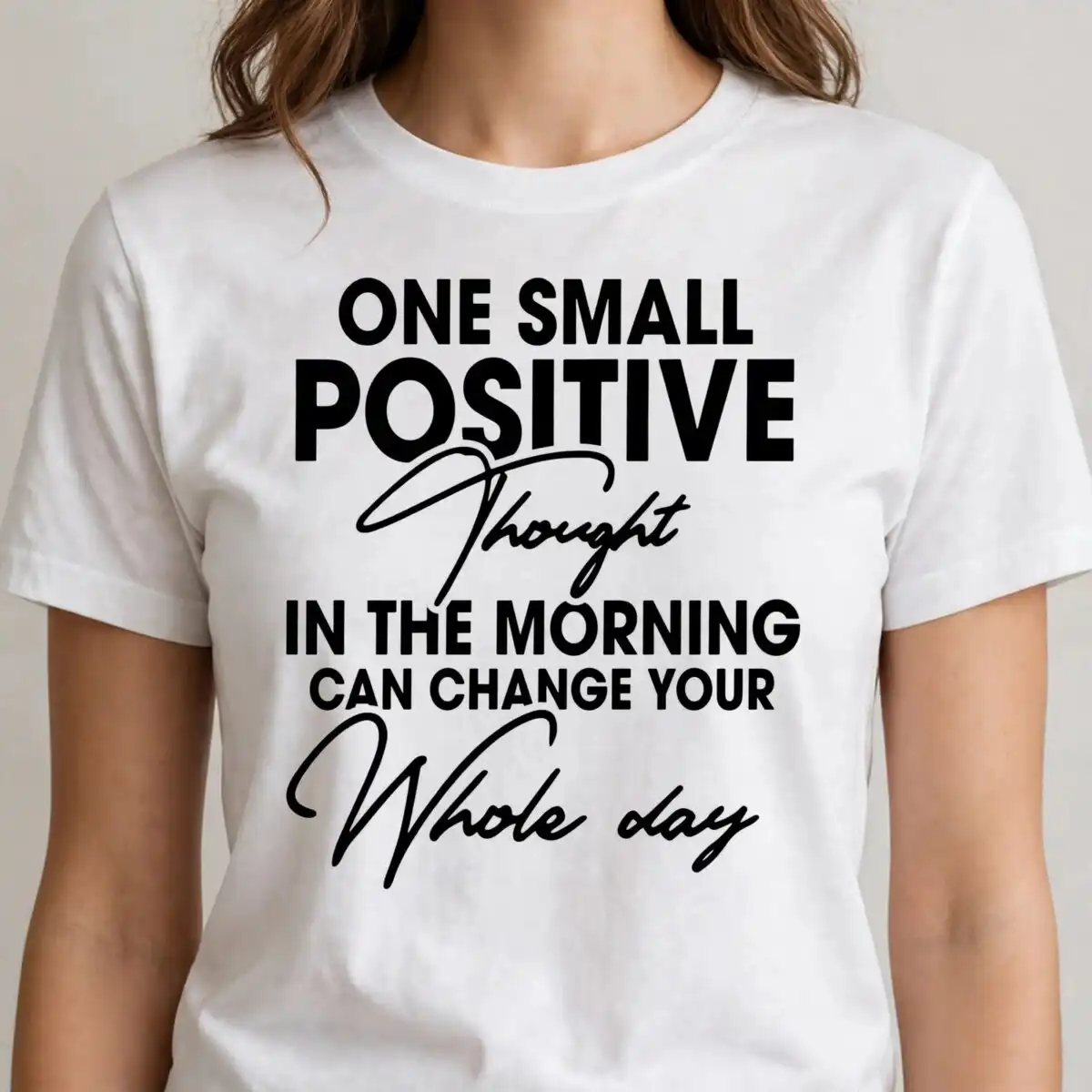 motivational quote lettering design: one small positive thought in black block and script motivational quote svg design printed on a plain product mockup