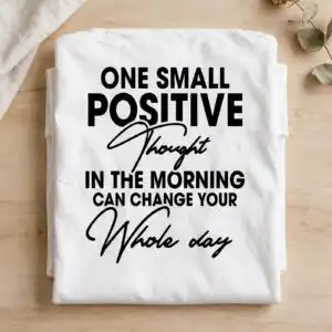 motivational quote lettering design: one small positive thought in black block and script motivational quote svg design printed on a plain product mockup