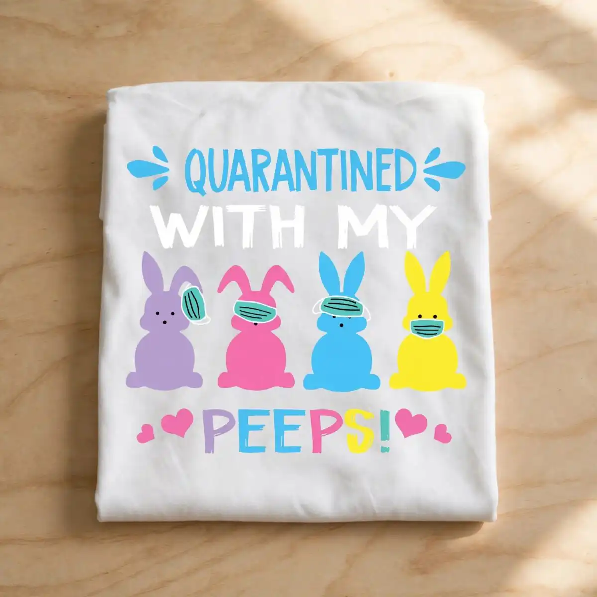 quarantined with my peeps easter bunny quote, four pastel bunnies in face masks pastel easter bunny clipart design printed on a plain product mockup