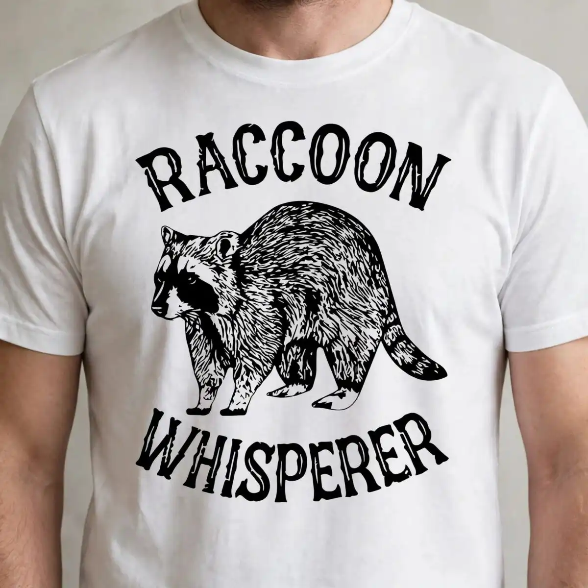 funny raccoon whisperer badge design for shirts, mugs and decals funny raccoon svg design printed on a plain product mockup