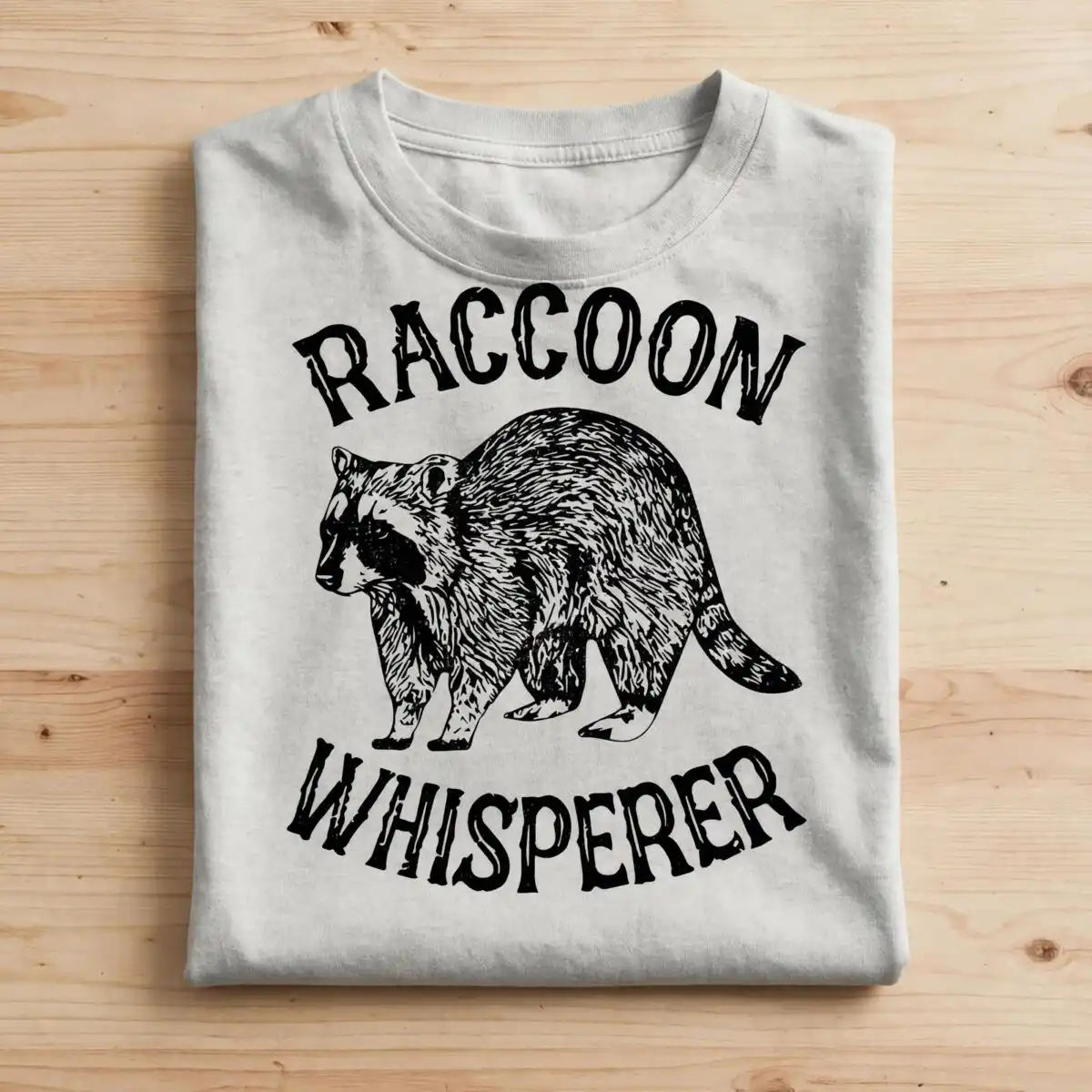 funny raccoon whisperer badge design for shirts, mugs and decals funny raccoon svg design printed on a plain product mockup