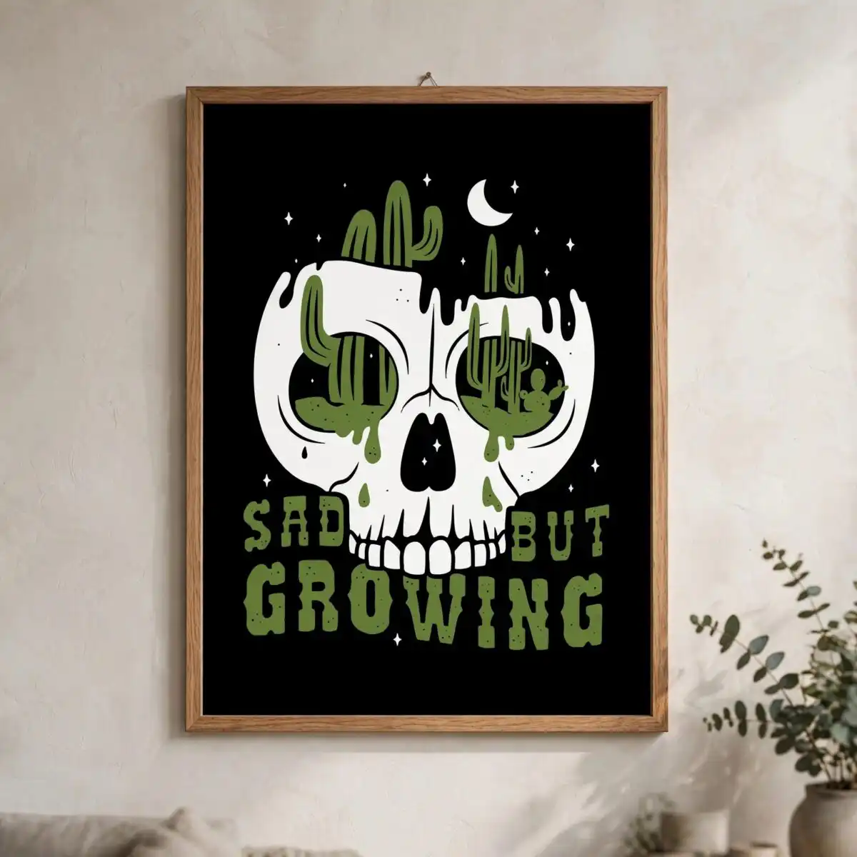 sad but growing white skull desert cactus boho graphic for adults sad but growing svg design printed on a plain product mockup