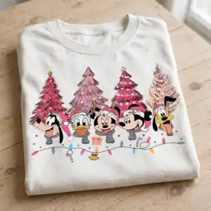 pink christmas five cartoon figures in winter hats with christmas trees christmas five cartoon figures winter svg design printed on a plain product mockup