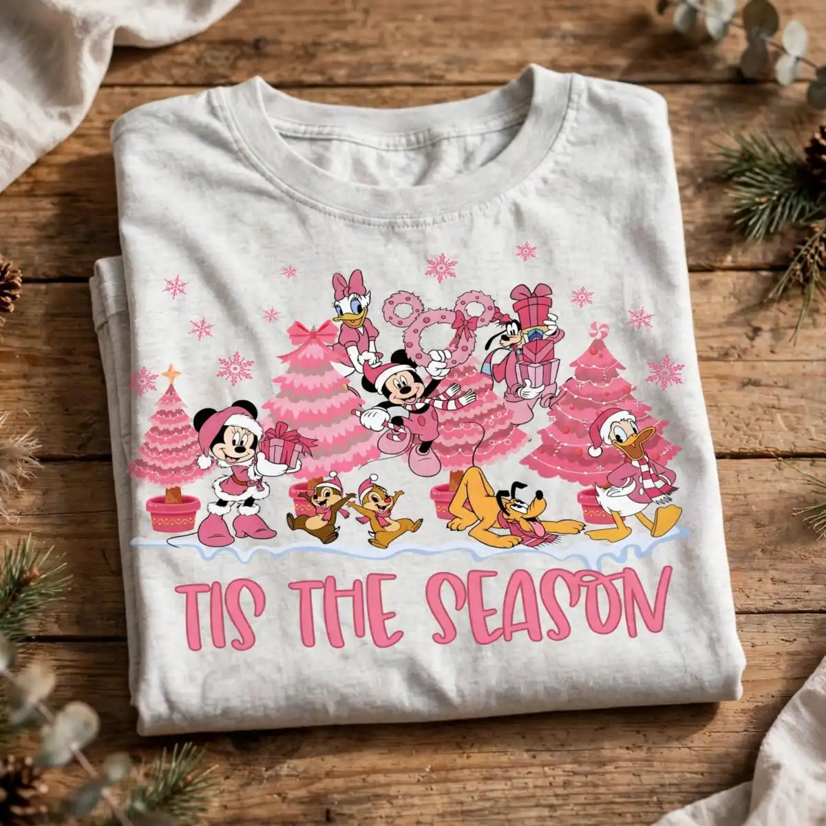 cute pink christmas group of cartoon animals with trees and gifts art christmas group cartoon animals pink svg design printed on a plain product mockup