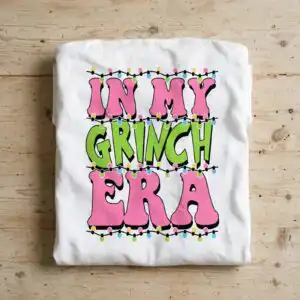 in my grinch era svg with christmas lights quote design text with Christmas lights design printed on a plain product mockup