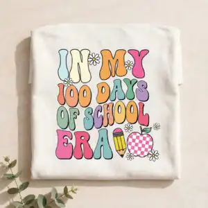 happy teacher day png: in my 100 days of school era retro groovy lettering set for shirts happy teacher day png design printed on a plain product mockup